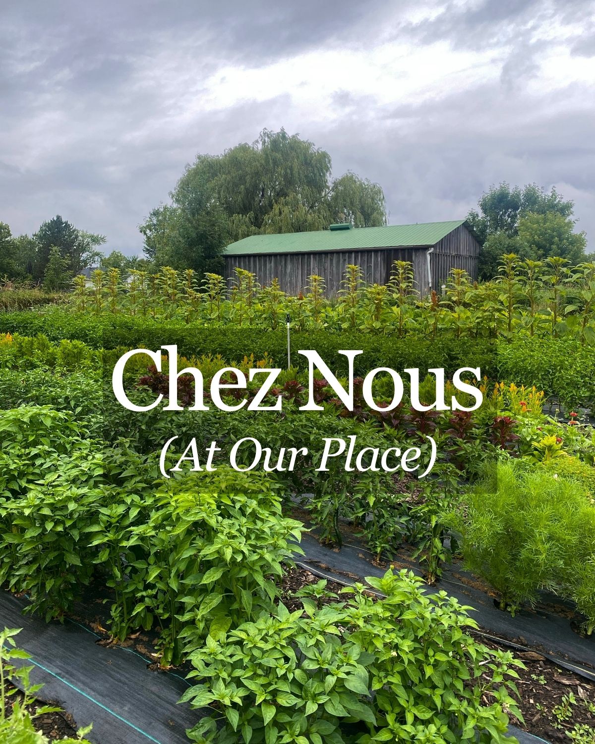 Chez Nous, meaning at our place, over a view of the farm fields and barn